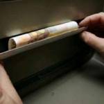 Bancomat cash trapping