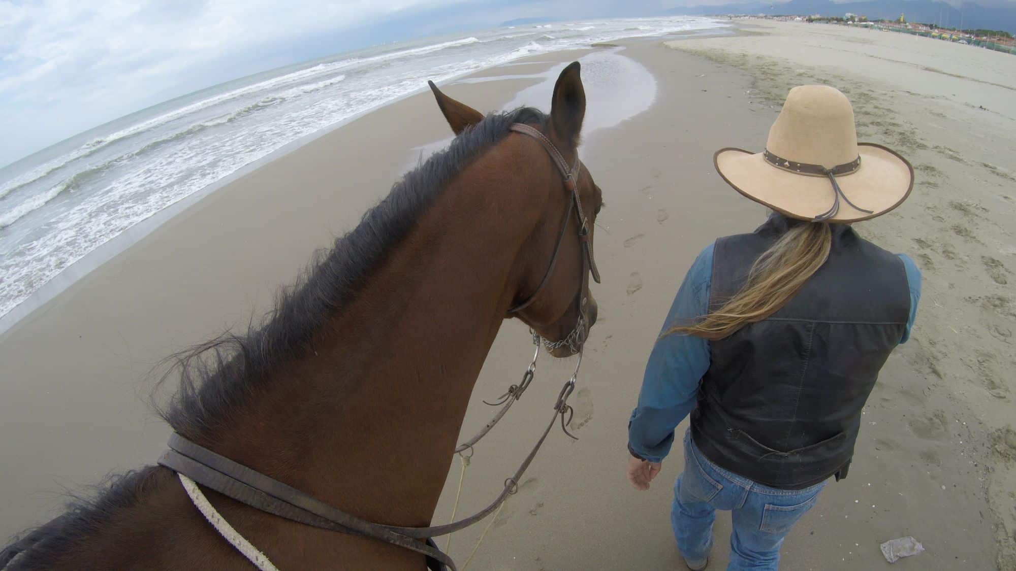 A cavallo in spiaggia